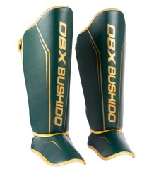 DBX Bushido Schienbein- und Fußschützer ProFighter Emerald/Gold
